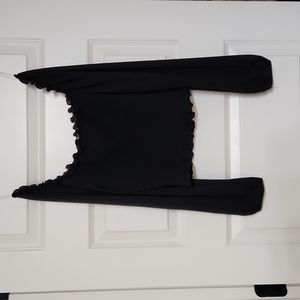 Off the shoulder top. Long slight sheer sleeves. Never worn